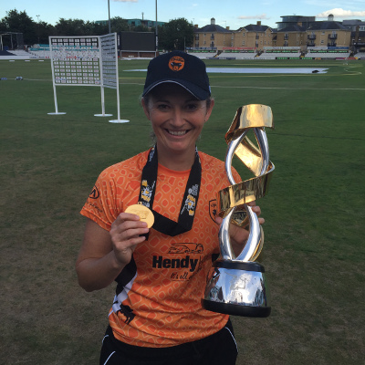 Charlotte Edwards With The KSL Trophy